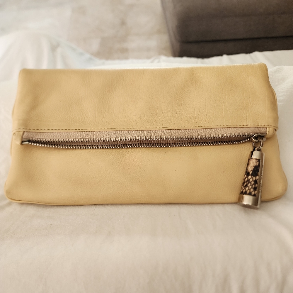 Michael Kors leather fold over clutch.